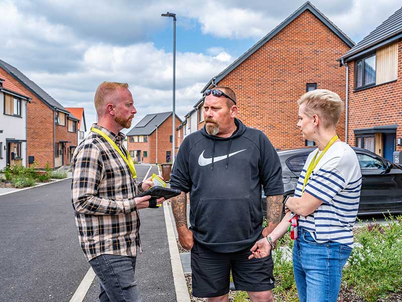 Housing team meeting a tenant