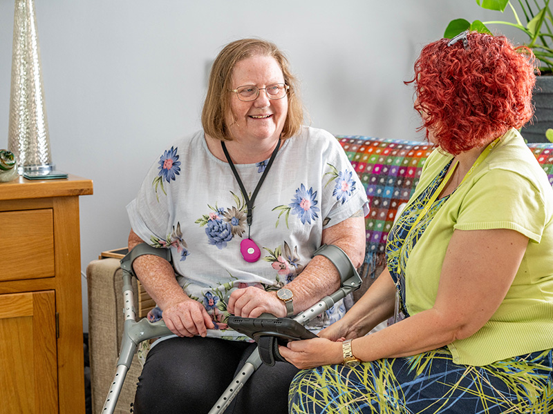 Housing officer visiting customer