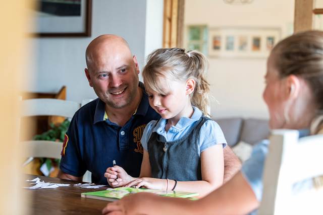 Parent and their children at the table