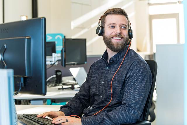 Staff member at their desk